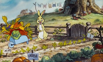 Movie still from “The Many Adventures of Winnie the Pooh” (1977), directed by John Lounsbery – A painting of a bunny rabbit in a garden; Wide shot, Low angle