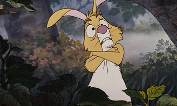Movie still from “The Many Adventures of Winnie the Pooh” (1977), directed by John Lounsbery – A cartoon of a rabbit with his arms crossed; Close Up shot, Low angle