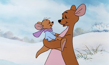 Movie still from “The Many Adventures of Winnie the Pooh” (1977), directed by John Lounsbery – A cartoon of a mouse holding a baby kangaroo; Medium shot, Low angle