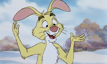 Movie still from “The Many Adventures of Winnie the Pooh” (1977), directed by John Lounsbery – A cartoon of a bunny rabbit with his arms outstreched; Close Up shot, Low angle