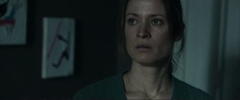 Movie still from “The Marco Effect” (2021), directed by Martin Zandvliet – A person looking at the camera; Close Up shot, Over the shoulder angle