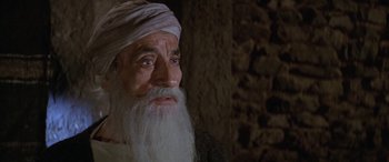 Movie still from “The Message” (1976), directed by Moustapha Akkad – An old man with a long white beard; Close Up shot, High angle