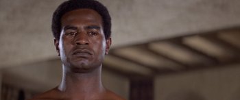 Movie still from “The Message” (1976), directed by Moustapha Akkad – A man's face in a room; Close Up shot, Low angle