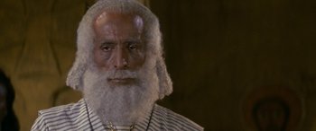 Movie still from “The Message” (1976), directed by Moustapha Akkad – An old man with a long white beard; Close Up shot, Low angle