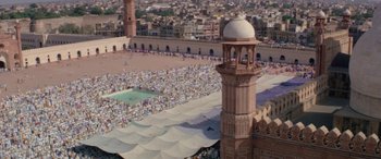 Movie still from “The Message” (1976), directed by Moustapha Akkad – An aerial view of a large crowd of people in a city; Extreme Wide shot, High angle