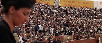 Movie still from “The Moment of Truth” (1965), directed by Francesco Rosi – A crowd of people standing on top of a field; Extreme Wide shot, High angle