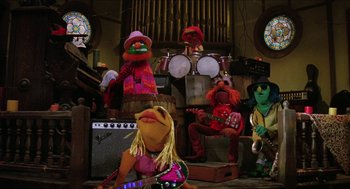 Movie still from “The Muppet Movie” (1979), directed by James Frawley – A group of people dressed up as the muppets; Wide shot, Low angle
