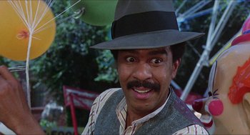 Movie still from “The Muppet Movie” (1979), directed by James Frawley – A person wearing a hat; Close Up shot, Low angle