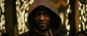 Movie still from “The Night Before” (2015), directed by Jonathan Levine – A person wearing a hooded jacket; Close Up shot, Low angle