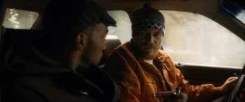 Movie still from “The Night Before” (2015), directed by Jonathan Levine – Two men sitting in the back seat of a car; Close Up shot, Over the shoulder angle