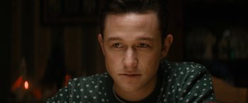 Movie still from “The Night Before” (2015), directed by Jonathan Levine – A person wearing a green shirt; Close Up shot, Over the shoulder angle
