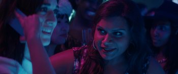 Movie still from “The Night Before” (2015), directed by Jonathan Levine – A person at a party; Close Up shot, Over the shoulder angle
