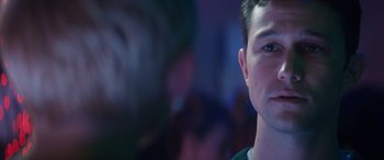 Movie still from “The Night Before” (2015), directed by Jonathan Levine – A man's face in a dark room; Close Up shot, Over the shoulder angle