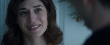 Movie still from “The Night Before” (2015), directed by Jonathan Levine – A woman's face with blue eyes; Close Up shot, Over the shoulder angle
