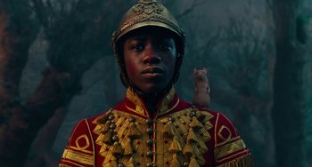 Movie still from “The Nutcracker and the Four Realms” (2018), directed by Joe Johnston – A man in a military uniform with a mouse on his shoulder; Close Up shot, Low angle