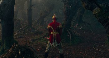 Movie still from “The Nutcracker and the Four Realms” (2018), directed by Joe Johnston – A man in a uniform in the woods; Wide shot, Low angle