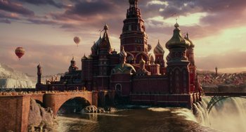 Movie still from “The Nutcracker and the Four Realms” (2018), directed by Joe Johnston – An image of a castle with a balloon in the background; Extreme Wide shot, Low angle