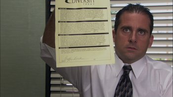 Movie still from “The Office” (2005), created by Ricky Gervais – Close Up shot, High angle