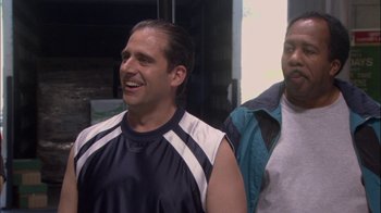 Movie still from “The Office” (2005), created by Ricky Gervais – Medium shot, Over the shoulder angle