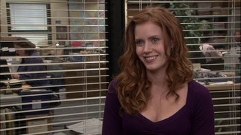 Movie still from “The Office” (2005), created by Ricky Gervais – Medium shot, Over the shoulder angle