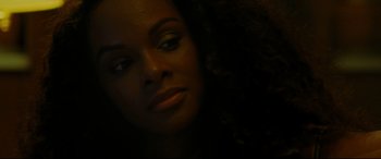 Movie still from “The Old Man & the Gun” (2018), directed by David Lowery – A woman's face in the dark; Close Up shot, Over the shoulder angle