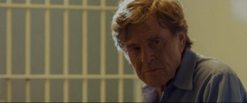 Movie still from “The Old Man & the Gun” (2018), directed by David Lowery – An older man in front of a jail cell; Close Up shot, Low angle