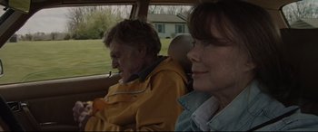Movie still from “The Old Man & the Gun” (2018), directed by David Lowery – A man and a woman sitting in the back of a car; Close Up shot, Over the shoulder angle