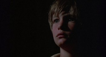 Movie still from “The Other” (1972), directed by Robert Mulligan – A young boy is looking into the dark; Close Up shot, Low angle