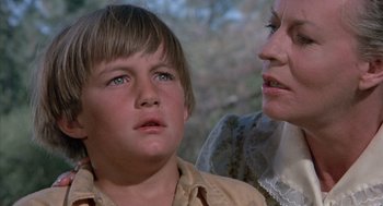 Movie still from “The Other” (1972), directed by Robert Mulligan – A woman and a boy looking at each other; Close Up shot, Low angle