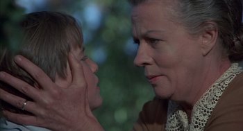 Movie still from “The Other” (1972), directed by Robert Mulligan – An older woman and a young boy looking into each others eyes; Close Up shot, Over the shoulder angle