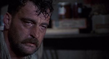 Movie still from “The Other” (1972), directed by Robert Mulligan – A person with wet hair; Close Up shot, High angle