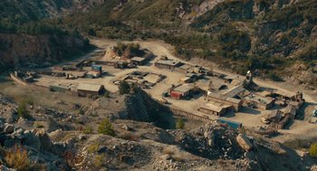 Movie still from “The Outpost” (2019), directed by Rod Lurie – An aerial view of an abandoned gold mining town; Extreme Wide shot, High angle