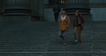 Movie still from “The Panic in Needle Park” (1971), directed by Jerry Schatzberg – A man and a woman walking up some stairs; Wide shot, Low angle