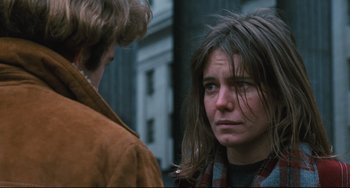 Movie still from “The Panic in Needle Park” (1971), directed by Jerry Schatzberg – A woman with long brown hair is looking at another woman with long brown hair; Close Up shot, Over the shoulder angle