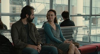 Movie still from “The Past” (2013), directed by Asghar Farhadi – A woman sitting on a bench next to a man; Medium shot, Over the shoulder angle