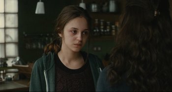 Movie still from “The Past” (2013), directed by Asghar Farhadi – A young woman is looking at another young woman; Close Up shot, Over the shoulder angle