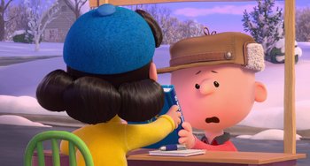 Movie still from “The Peanuts Movie” (2015), directed by Steve Martino – A girl and charlie brown are sitting at a table; Medium shot, Over the shoulder angle