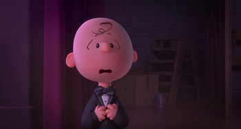 Movie still from “The Peanuts Movie” (2015), directed by Steve Martino – A cartoon of a man in a suit and bow tie; Medium shot, High angle