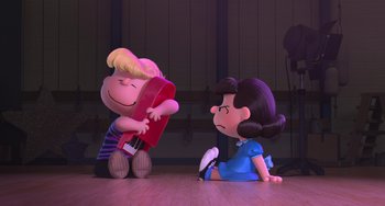 Movie still from “The Peanuts Movie” (2015), directed by Steve Martino – A charlie brown and lucy character sitting on the floor; Wide shot, Over the shoulder angle