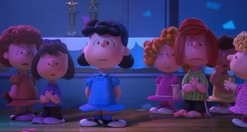 Movie still from “The Peanuts Movie” (2015), directed by Steve Martino – A group of people standing next to each other on top of a wooden table; Wide shot, Over the shoulder angle