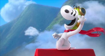 Movie still from “The Peanuts Movie” (2015), directed by Steve Martino – A cartoon character sitting on top of a red table holding an apple; Extreme Wide shot, Low angle