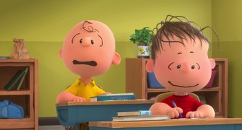 Movie still from “The Peanuts Movie” (2015), directed by Steve Martino – A charlie brown and linus van pelt sitting at a desk; Close Up shot, Over the shoulder angle