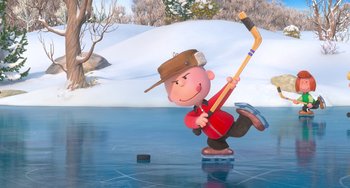 Movie still from “The Peanuts Movie” (2015), directed by Steve Martino – Charlie brown playing ice hockey on a frozen lake; Extreme Wide shot, High angle