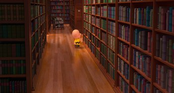 Movie still from “The Peanuts Movie” (2015), directed by Steve Martino – A charlie brown figure is in the middle of a library; Extreme Wide shot, High angle