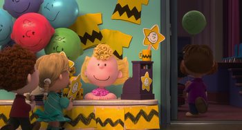 Movie still from “The Peanuts Movie” (2015), directed by Steve Martino – A charlie brown birthday party with a charlie brown cake and decorations; Medium shot, Over the shoulder angle