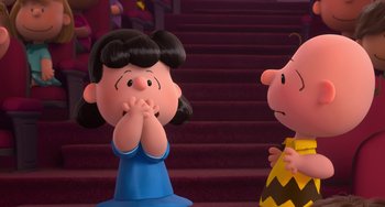 Movie still from “The Peanuts Movie” (2015), directed by Steve Martino – A couple of people that are sitting on some stairs; Medium shot, Over the shoulder angle