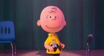 Movie still from “The Peanuts Movie” (2015), directed by Steve Martino – A charlie brown cartoon character is posed for a picture; Medium shot, High angle