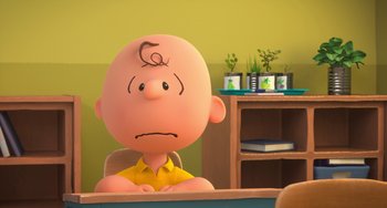 Movie still from “The Peanuts Movie” (2015), directed by Steve Martino – A charlie brown character sitting at a desk; Close Up shot, High angle