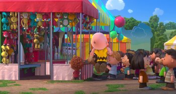 Movie still from “The Peanuts Movie” (2015), directed by Steve Martino – A group of people standing next to each other near an amusement park; Extreme Wide shot, High angle