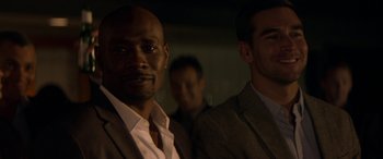 Movie still from “The Perfect Guy” (2015), directed by David M. Rosenthal – A man in a suit standing next to another man in a suit; Close Up shot, Over the shoulder angle